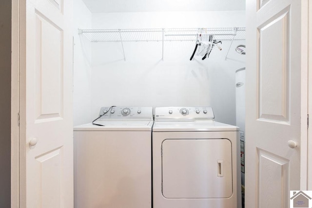 laundry area featuring laundry area and separate washer and dryer