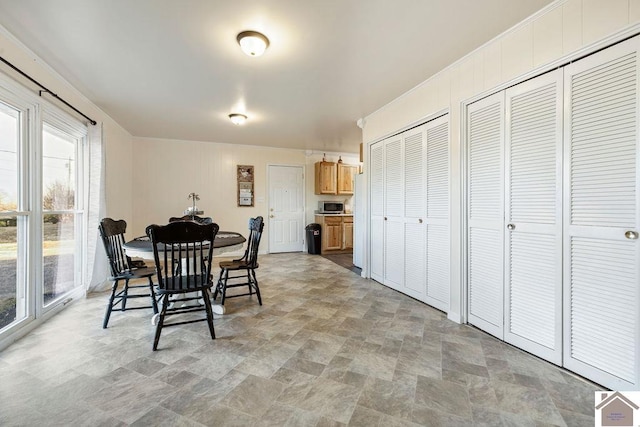 dining area with stone finish floor