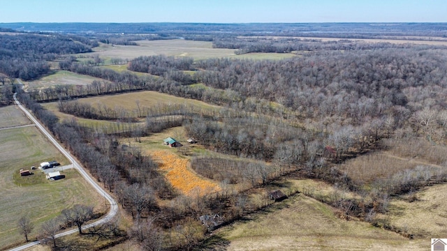 birds eye view of property featuring a rural view