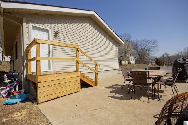 exterior space with outdoor dining space