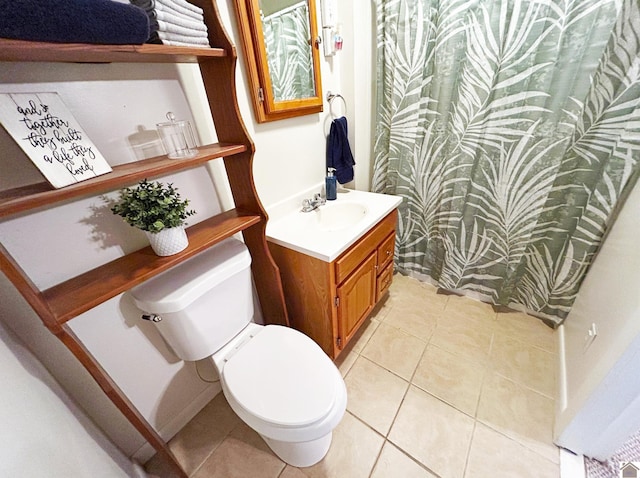 434 W Bellville St, Marion, KY 42064 - bathroom with vanity, tile patterned floors, and toilet