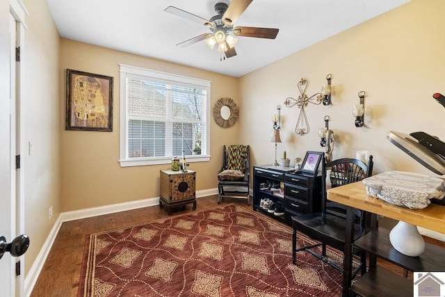 office area featuring baseboards, wood finished floors, and ceiling fan