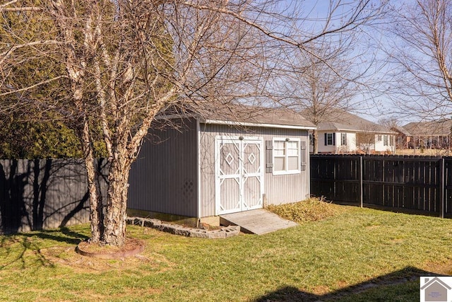 view of shed featuring a fenced backyard