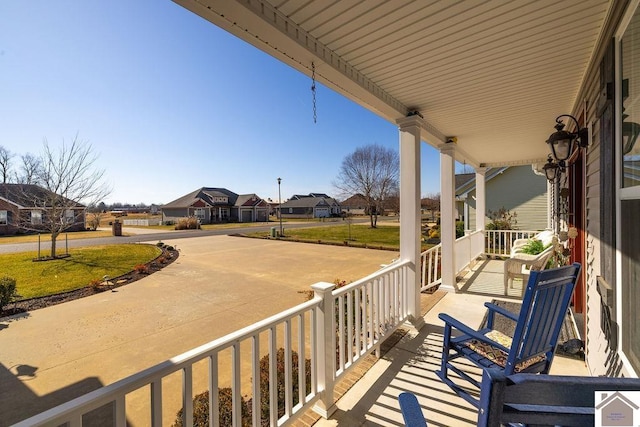 balcony featuring a porch