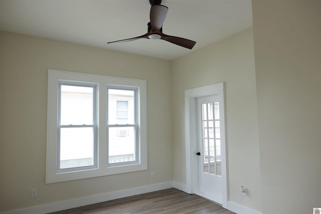503 3rd St, Fulton, KY 42041 - unfurnished room featuring baseboards, wood finished floors, and ceiling fan