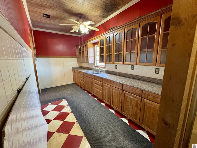 504 Pine St, Murray, KY 42071 - kitchen featuring wainscoting, crown molding, a sink, and a ceiling fan