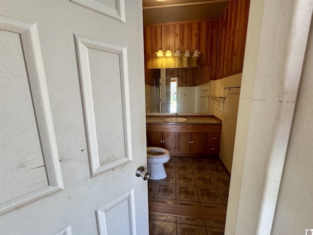 504 Pine St, Murray, KY 42071 - half bathroom featuring toilet, tile patterned flooring, and vanity