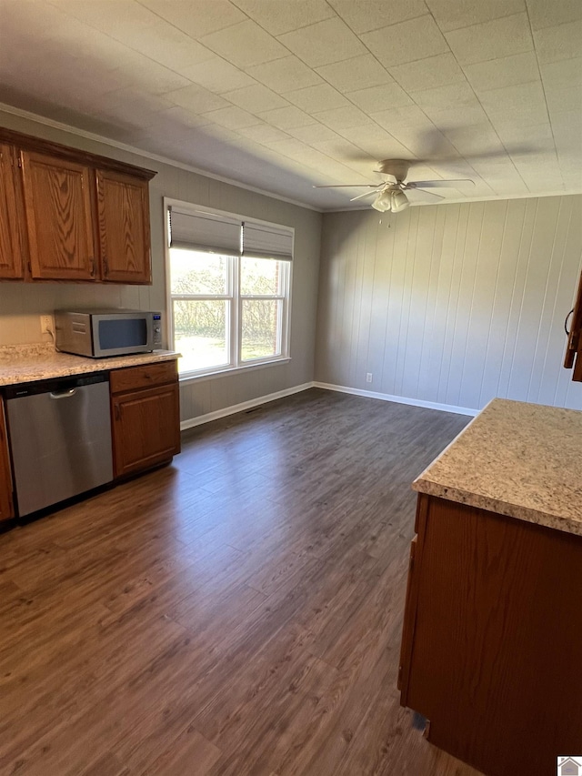 1201 US Highway 68e, Benton, KY 42025 - kitchen featuring dark wood-style flooring, light countertops, appliances with stainless steel finishes, and a ceiling fan
