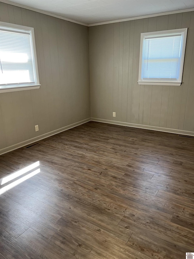 1201 US Highway 68e, Benton, KY 42025 - unfurnished room with visible vents, dark wood-style floors, baseboards, and crown molding