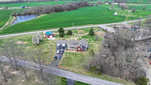 bird's eye view with a water view and a rural view