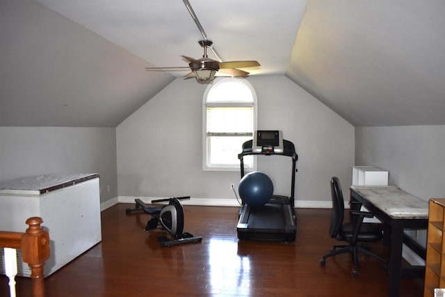 exercise area with a ceiling fan, baseboards, vaulted ceiling, and wood finished floors