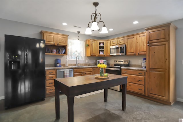 kitchen featuring light countertops, a sink, open shelves, appliances with stainless steel finishes, and hanging light fixtures