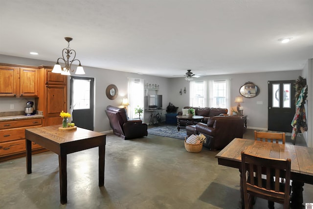 dining room with baseboards, recessed lighting, ceiling fan, and finished concrete floors