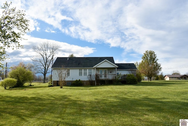 ranch-style home featuring a front lawn