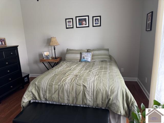 198 Smith Ln, Mayfield, KY 42066 - bedroom with baseboards and wood finished floors