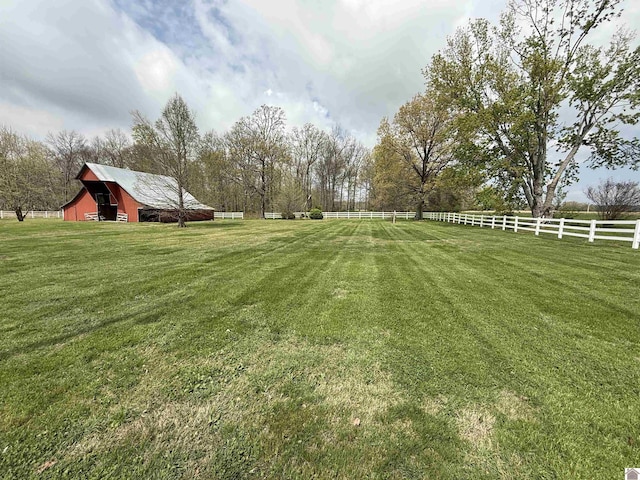 6060 State Route 94 W, Murray, KY 42071 - view of yard with an outdoor structure, fence, a barn, and a rural view
