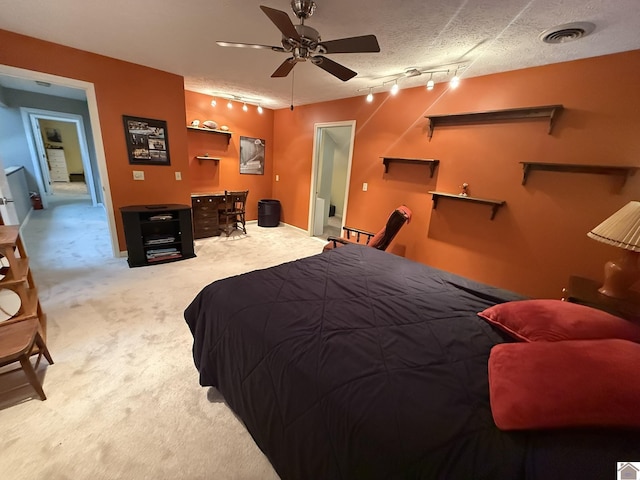 6060 State Route 94 W, Murray, KY 42071 - bedroom with track lighting, carpet flooring, a ceiling fan, and visible vents