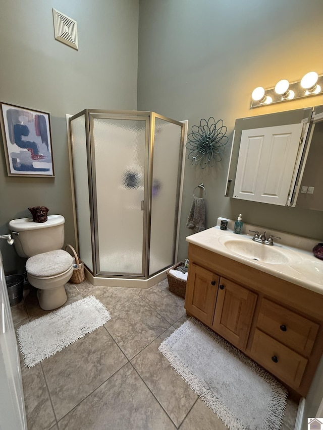 6060 State Route 94 W, Murray, KY 42071 - bathroom with visible vents, toilet, a shower stall, vanity, and tile patterned floors