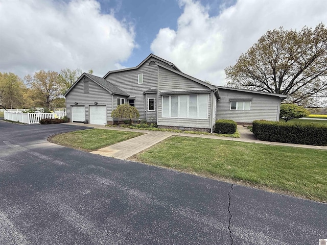 6060 State Route 94 W, Murray, KY 42071 - view of front of property featuring a garage, a front yard, driveway, and fence