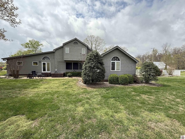 6060 State Route 94 W, Murray, KY 42071 - rear view of house featuring a patio and a yard