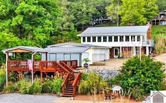 201 Blue River Rd, Cadiz, KY 42211 - rear view of property with a chimney, a deck, and stairway