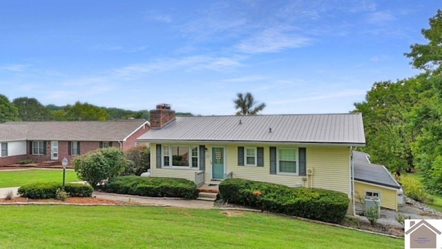 201 Blue River Rd, Cadiz, KY 42211 - ranch-style home with metal roof, a chimney, and a front lawn