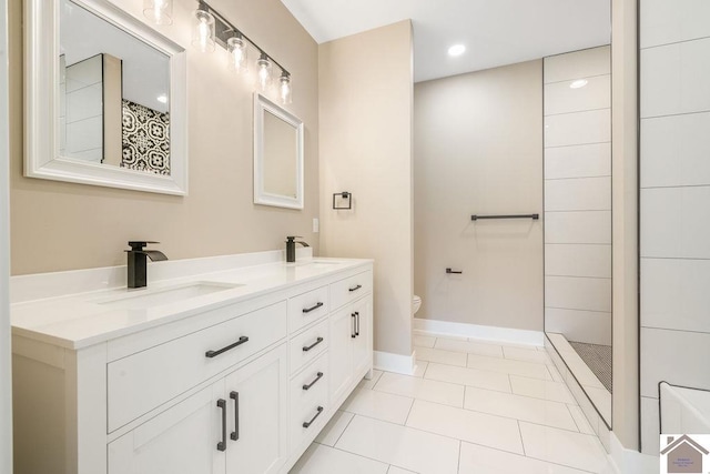 102 Ironwood Dr, Murray, KY 42071 - bathroom featuring a tile shower, toilet, tile patterned flooring, and a sink