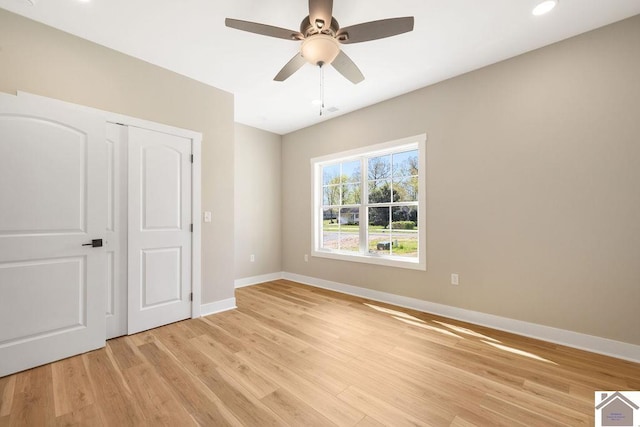 102 Ironwood Dr, Murray, KY 42071 - unfurnished bedroom with a ceiling fan, baseboards, recessed lighting, and light wood-style floors