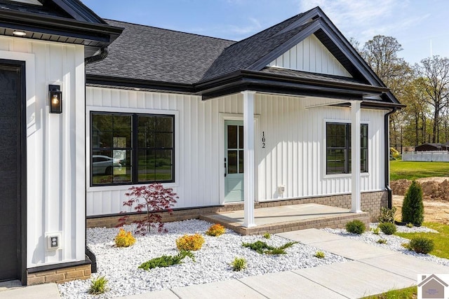 102 Ironwood Dr, Murray, KY 42071 - property entrance with covered porch and roof with shingles