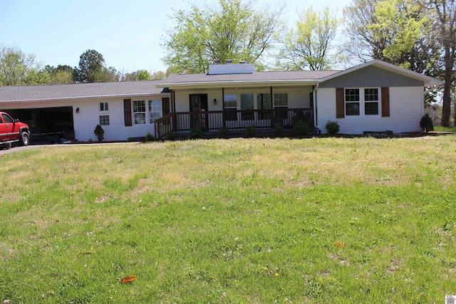 ranch-style house with a chimney, a front lawn, a porch, and a garage