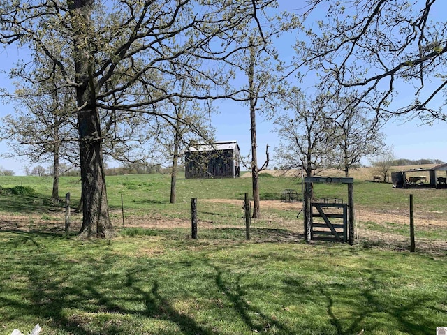 1368 Pritchard Rd, Wingo, KY 42088 - view of yard with a rural view, fence, and an outdoor structure