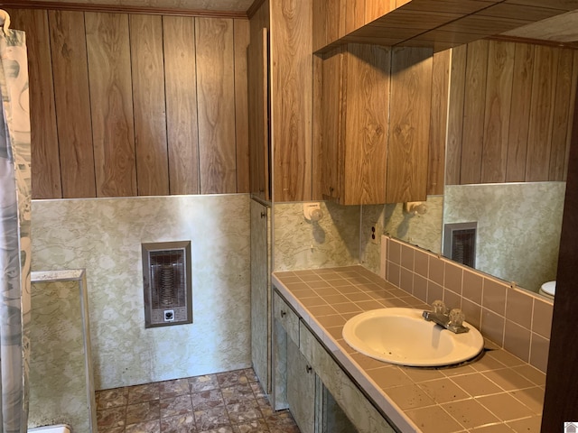 1368 Pritchard Rd, Wingo, KY 42088 - bathroom with stone finish floor, tasteful backsplash, and vanity