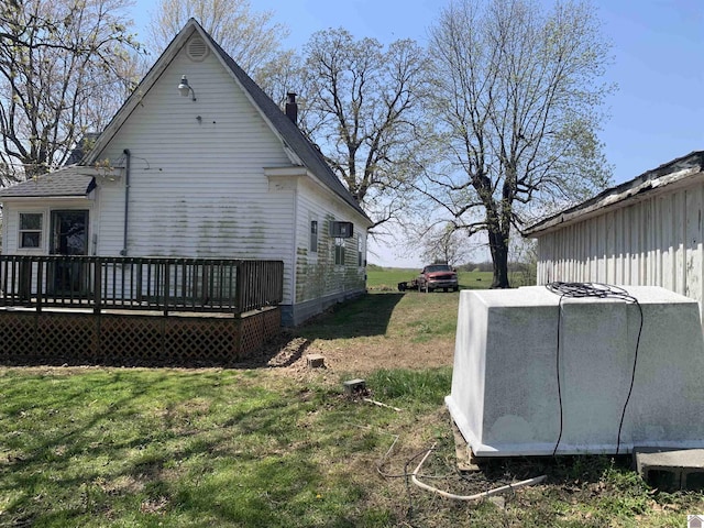 1368 Pritchard Rd, Wingo, KY 42088 - view of property exterior featuring a wooden deck, a lawn, and a chimney