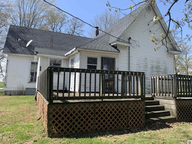1368 Pritchard Rd, Wingo, KY 42088 - rear view of house featuring a yard, roof with shingles, and a deck