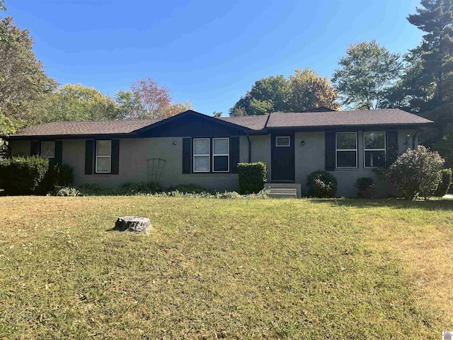 ranch-style home with a front yard