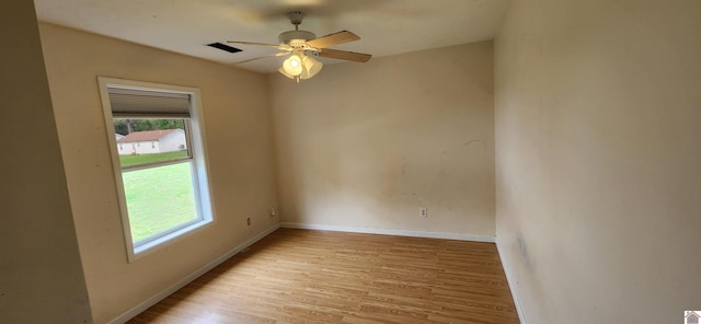 178 Tice, Mayfield, KY 42066 - empty room with light wood-style flooring, visible vents, a ceiling fan, and baseboards