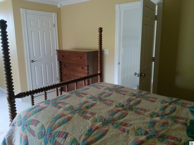 bedroom with crown molding