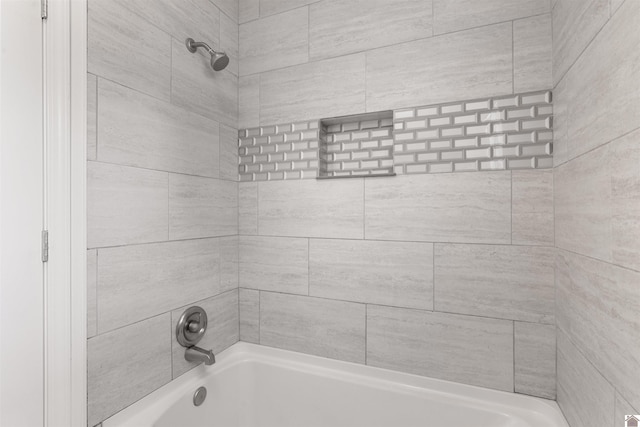 bathroom with shower / bath combination