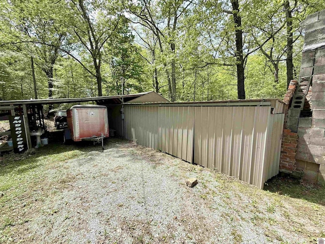 124 Miller Ln, Gilbertsville, KY 42044 - exterior space featuring gravel driveway and fence
