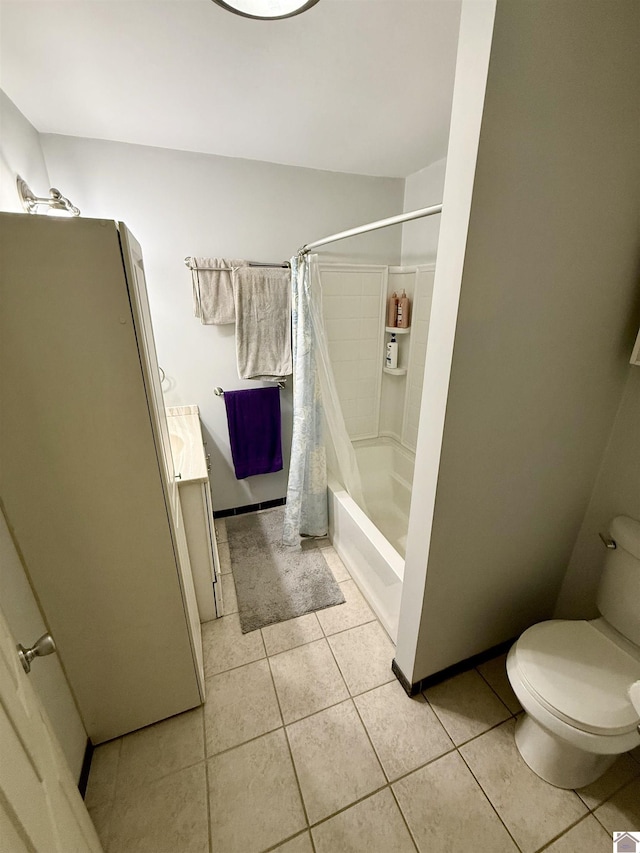 124 Miller Ln, Gilbertsville, KY 42044 - full bathroom featuring shower / bath combo, vanity, toilet, and tile patterned flooring
