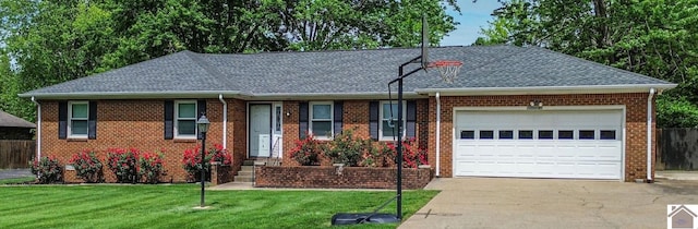 ranch-style home with concrete driveway, a garage, a front lawn, and brick siding