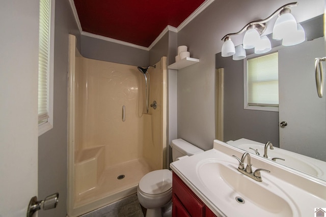 bathroom featuring crown molding, toilet, a shower, and vanity