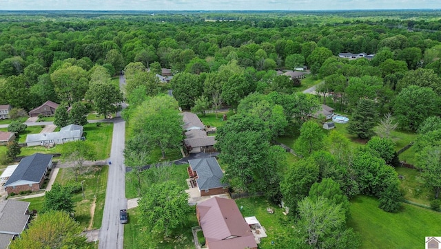 aerial view featuring a residential view and a forest view