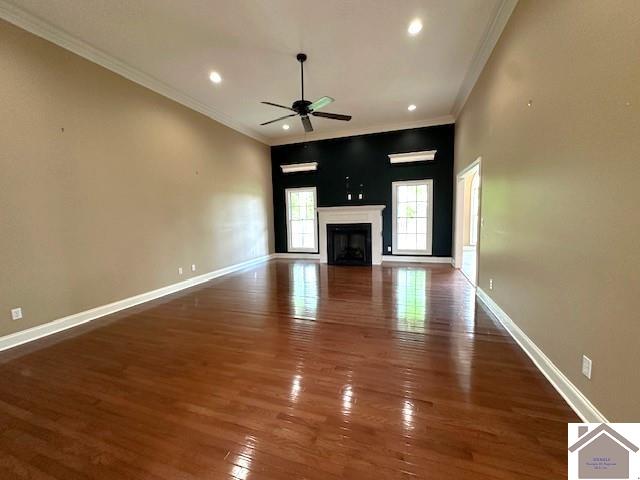 57 Rippling Creek Dr, Murray, KY 42071 - unfurnished living room with recessed lighting, wood finished floors, ornamental molding, ceiling fan, and baseboards