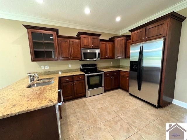 57 Rippling Creek Dr, Murray, KY 42071 - kitchen featuring light stone countertops, glass insert cabinets, stainless steel appliances, a sink, and a peninsula