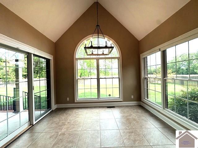 57 Rippling Creek Dr, Murray, KY 42071 - entryway featuring a wealth of natural light, light tile patterned floors, and baseboards