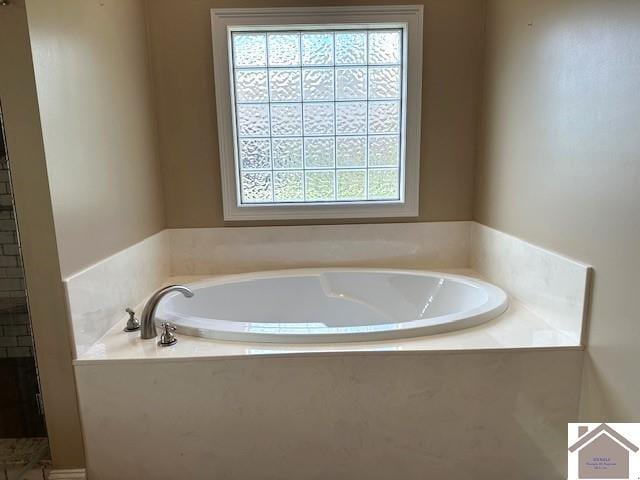 57 Rippling Creek Dr, Murray, KY 42071 - full bath with walk in shower and a bath