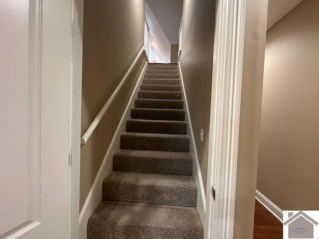 57 Rippling Creek Dr, Murray, KY 42071 - staircase featuring baseboards