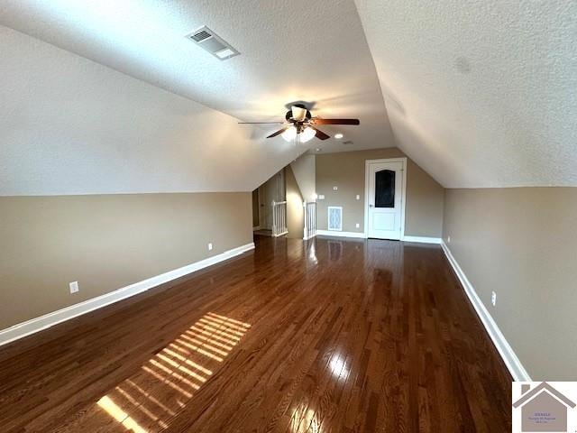 57 Rippling Creek Dr, Murray, KY 42071 - additional living space featuring a textured ceiling, visible vents, baseboards, wood finished floors, and a ceiling fan