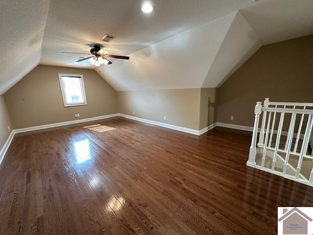 57 Rippling Creek Dr, Murray, KY 42071 - additional living space with lofted ceiling, wood finished floors, and baseboards